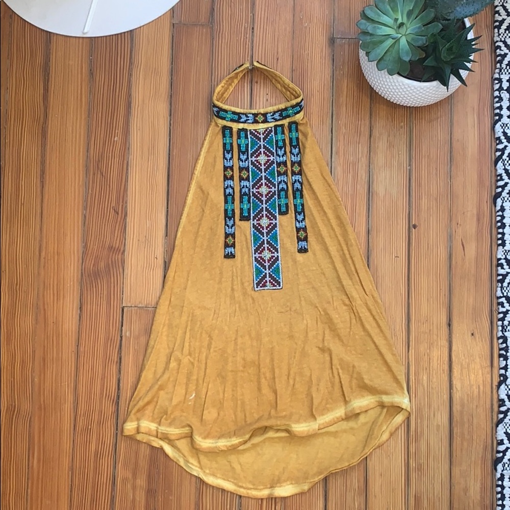 Tank with open back. Perfect for music festival